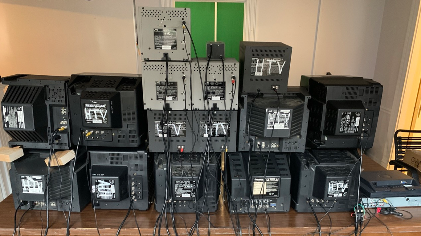 Back view of Autonome Kunst installation showing CRT monitors and wiring